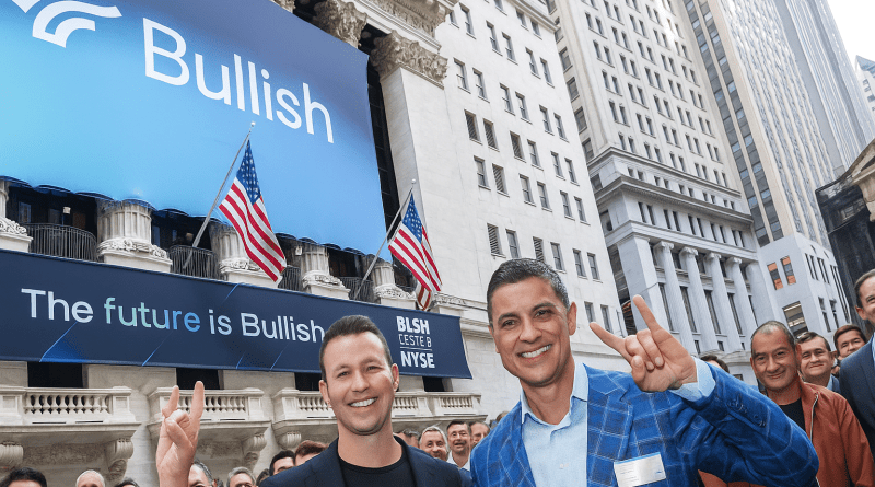 bullish execs in front of stock exchange building